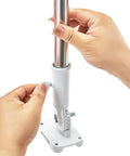 Hands assembling 4 Ft Pro Grade Stainless Dive Flag Pole Kit With 1 Inch Tangle Free Pole, 360 Degree Rings, Adjustable 180 Degree Bracket