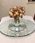 Rotating Lazy Susan Turntable With Glass Top And Silent Bearing on dining table, decorative vase centered, 360-degree swivel, adjustable size