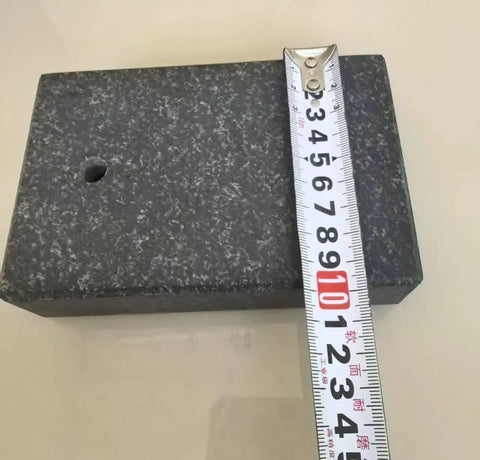 Pro Grade Granite Comparator Base 150mm By 100mm By 50mm With Digital Indicator for calibration on beige surface