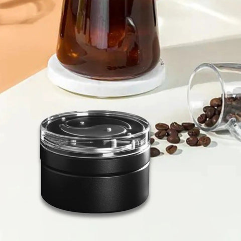 Smooth Operator 58mm Coffee Distributor And Leveler For Tight Espresso Pucks on a kitchen counter with coffee beans.