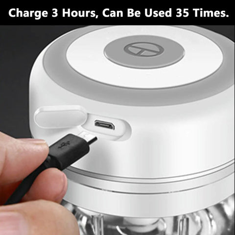 USB Rechargeable Electric Mini Garlic Chopper 100Ml Cordless Food Processor charging port with USB cable connected.