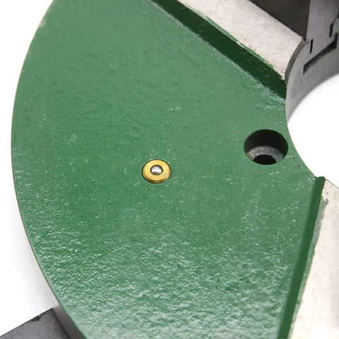 Close-up view of Heavy Duty 3-Jaw Lathe Chuck 12 Inch showing green steel body and center bore hole for wood lathe and drilling.