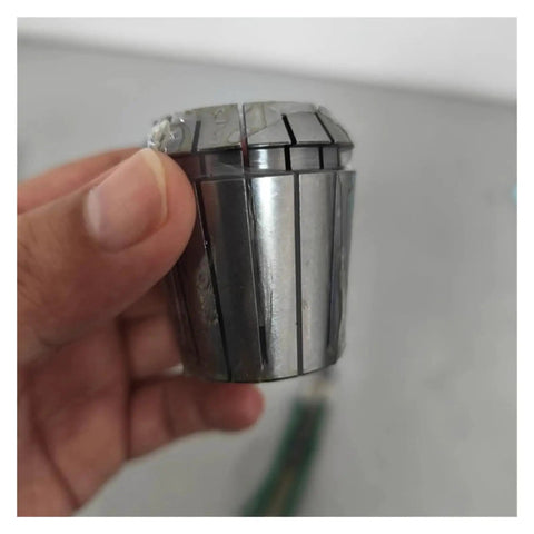 Hand holding Top Tier Spring Collet For CNC Milling And Engraving Machine With ER11 ER20 ER32 Precision Holders.