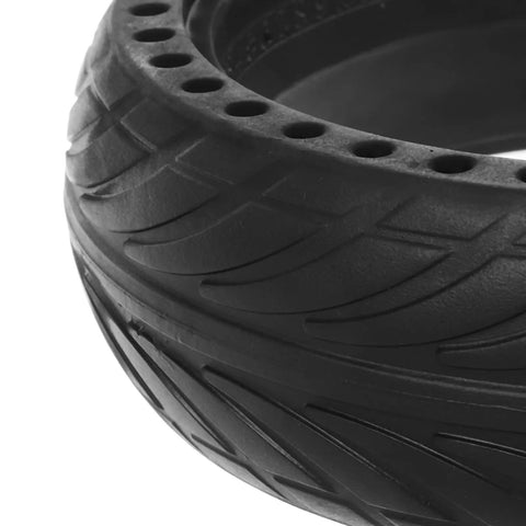 Close-up of Replacement Wheel For Electric Scooter With Honeycomb Tire And Shock Absorption Sturdy Black Rubber Wheel Easy Install Safe Durable Scooter Replacement Part