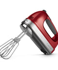 Killer Performance Nine Speed Hand Mixer Featuring A Vibrant Candy Apple Red Design And Durable Attachments For No Sweat Battering And Fast Cleanup Jobs Around The House