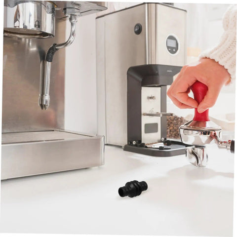 Steam Wand Rubber Guard Sleeve Heat Insulation Accessory For Espresso Machines on counter next to espresso setup.