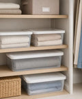 Clear Plastic Storage Bins 6 Quart With White Snap On Lids Stackable Set Of Ten versatile containers organizing blankets on shelves.