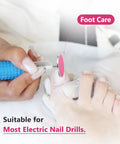 Close-up of sanding paper disc set with metal nail drill bit in use for foot care, showing pedicure process.