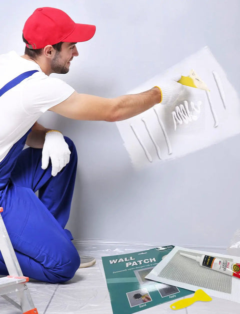 Man using 15-Piece Drywall Repair Kit With Self Adhesive Fiberglass Mesh Patches In 2, 4, 6, 8 Inch Sizes, Aluminum Plate Patches And Scraper Tools for wall repair.
