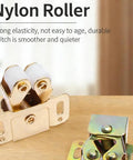 Four Piece Cabinet Door Catches Featuring Bulletproof Magnetic Dampers And Adjustable Metal Mounts For Kitchens And Wardrobes With A Dead Simple Install That Delivers Slick Soft Close Action Every Time, close-up of nylon roller hardware.