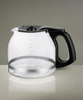 Front view: glass 12-cup replacement coffee carafe with black handle for Keurig K-Duo