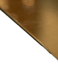 Close-up of Copper Sheet 0.025 Inch Thick, 6 Inch Wide, 12 Inch Long For DIY Metalworking Jewelry Making And Home Decor Projects, corner view.