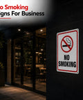 Heavy Duty No Smoking Signs For Business And Restaurants, 10 X 7 Inch Aluminum Metal No Vaping Wall Plaque With Rounded Edges, Rust Free Easy Hang Indoor Outdoor 4 Pack on building exterior.