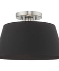 One Light Brushed Nickel Ceiling Mount Fixture With Black Accents featuring a sleek black drum shade and brushed nickel base.