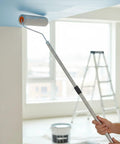 Premium Paint Roller Kit With Adjustable Stainless Steel Pole Effortlessly Reach High Walls And Ceilings Ladder Free Home Painting Projects Smooth Finish Weekend Warrior Approved Easy Setup in use reaching a high ceiling.