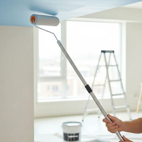 Premium Paint Roller Kit With Adjustable Stainless Steel Pole Effortlessly Reach High Walls And Ceilings Ladder Free Home Painting Projects Smooth Finish Weekend Warrior Approved Easy Setup in use reaching a high ceiling.