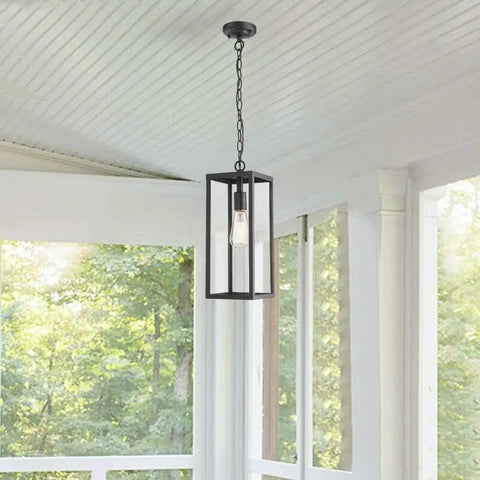 15 Inch Outdoor Pendant Lantern Light With Clear Glass For Patio Pathway And Hallway, hanging on white porch with trees in view