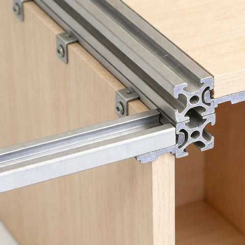 Built Tough Heavy Duty Aluminum Shelf Brackets Set for 202, 3030, 4040 Corner Fittings in use on cabinet shelving