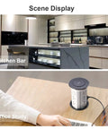 Total Game Changer Smart Motorized Pop-Up Power Station on kitchen bar and office desk showing AC outlets and USB ports.