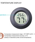 Two Pack Mini Hygrometer Thermometer Round Indoor Outdoor Humidity Meter With Digital Readout And Fahrenheit Celsius Switch, Accurate Humidity And Temperature Readings For Home Office Greenhouse black round display showing 26.6°C and 77% humidity
