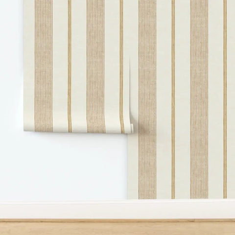 Level Up Your Space With Cream Modern Gold Matte Linen Wallpaper Game Changer PVC Free Durable Wall Covering Pro Grade Paste To Paper Design For Living Areas showing beige stripes and gold accents.