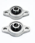 Badass 10mm Zinc Alloy Pillow Block Bearings With Housing 10 Pack Ultra Durable Chrome Steel Balls Run Sick Smooth Low Noise Self Aligning Fits Any Shaft Great For Garage Shop Projects Reliability And Heavy Duty Strength Guaranteed. Two 10mm zinc alloy pillow block bearings with housing