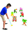 Child playing with Tropical Luau Mini Golf Set For Kids With Toddler Golf Clubs Putting Mat Markers Palm Tree And Pineapple Hole Markers