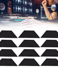 Sick Acoustic Panel Set With 12 Pieces Of Trapezoidal Soundproof Foam arranged for sound absorption in a music studio.