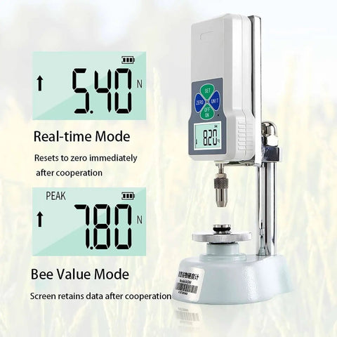 Top Notch Digital Grain Hardness Tester With Slick Mini Crop Firmness Gauge featuring bright backlit LCD display in use.