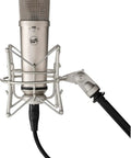 87 Style Large Diaphragm Condenser Microphone with Shock Mount Nickel Finish attached to a boom arm