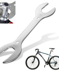 All In One 4 In 1 Bicycle Wrench Kit For Quick Bike Repairs, chrome-vanadium steel with 30mm to 40mm sizes next to a bike