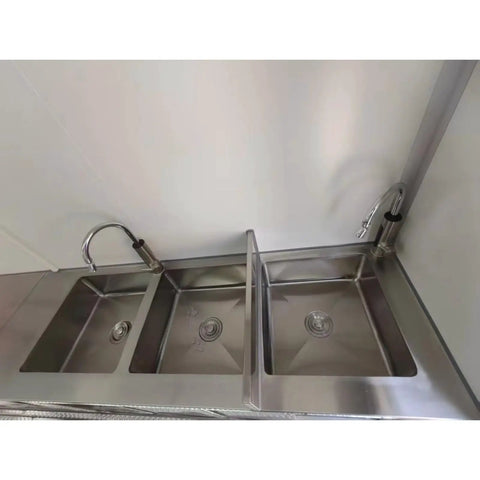 Dual stainless steel sinks in Fully Equipped Mobile Food Trailer Kitchen For Fast Food And Dessert Concession Cart Perfect For Street Events