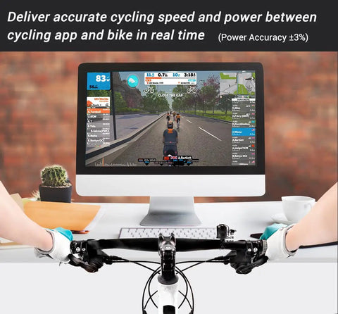 Cyclist using Smart Wheel On Bike Trainer With Bluetooth And ANT Plus Connectivity for Zwift on virtual ride setup with monitor
