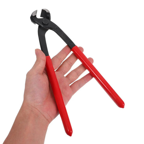 Kick Your Plumbing Game Up With This Heavy Duty Single And Double Ear Hose Clamp Tool Kit Ranging From 6mm To 23.5mm For A Tight Leak Free Grip On Any Pipe Or Hose Job Without The Hassle. red-handled hose clamp pliers held in hand, steel jaw tool for 6mm-23mm ear clamps