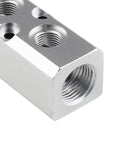 Close-up of Two Way Pneumatic Manifold Air Distribution Block Ready To Roll Heavy Duty Aluminum Design With Two Inlets And Two Outlets 18mm Inlets 12mm Outlets Mounting 5mm Quick Connects For Compressors And Air Tools, showing threaded connections.