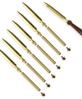 Premium Gold Woodturning Jig Set For Crafting Letter Openers Six Pack with gold jigs and wood handle, used for woodworking projects.