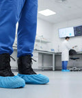 Disposable Boot And Shoe Covers 200 Pack Non Slip Durable For Indoor And Outdoor Use in a laboratory setting.