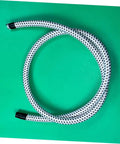 Heavy Duty Garment Steamer Hose Replacement For High Temperature Flexible Tube coiled on green background