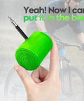 Close-up of neon-green TPU inner tube rolled up with a Presta valve for 29-inch MTB tires