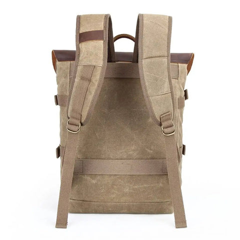 Back view of DSLR Camera Backpack Waterproof Canvas With Removable Dividers For Travel And Outdoor Shooting showing padded twin straps.