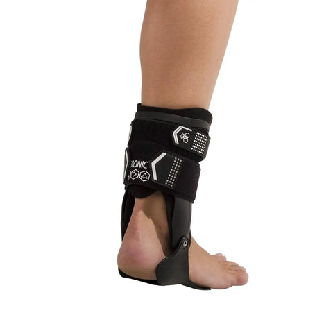 Side view of Stirrup Ankle Brace For Stability And Support Rigid Uprights Medium Right Anatomical Footplate on ankle