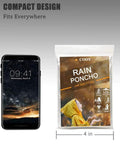 Emergency Disposable Rain Ponchos With Drawstring Hood For Adults Family Pack Clear 10 Pack next to smartphone showing compact design.