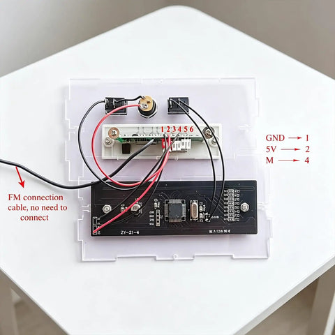 DIY Soldering Practice Kit And Electronic Speaker Build Project circuit board with wires on acrylic shell