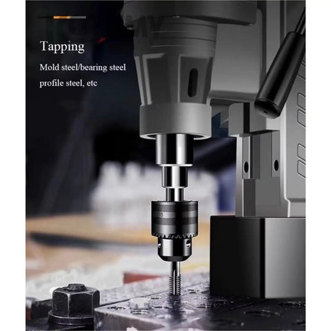 Industrial Grade Magnetic Drill Press With Powerful Suction Base For Heavy Duty Metalworking, showing tapping mechanism on metal surface.
