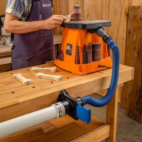 Ready-Mount Blast Gate for 2.5 Inch Dust Collection connected to woodworking machine, shows woodworking vacuum accessory setup
