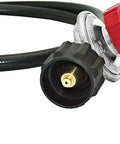Propane regulator and hose close-up: red knob on metal regulator with brass outlet and black hose.