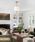 Straight Up Vintage Milk Glass Ceiling Light Fixture With Antique Brass Dome Shade Swoon Worthy Farmhouse And Schoolhouse Style Pendant Lamp 9 Inch Wide Bulb Cover Upgrade For Modern Home Decor in a stylish living room.