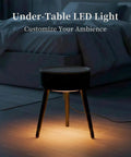 Under-table LED light illuminating a bedroom with a cozy ambience, customizable lighting atmosphere showcased in dark room.