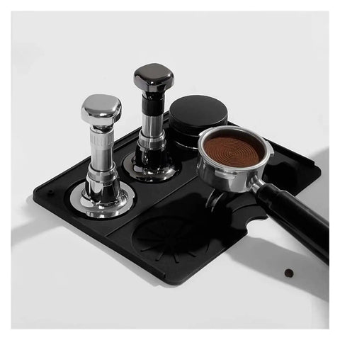Pro Grade Stainless Steel Espresso Tamper Kit With Auto Rebound For 51 53 And 58 Mm Portafilters arranged on a black mat.