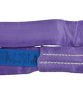 Close-up of 6 Ft Purple Polyester Endless Round Sling With 2600 Lbs Vertical Capacity, 2100 Lbs Choker Capacity, And 5200 Lbs Basket Capacity.